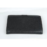 CHANEL - a Caviar leather wallet. The caviar leather exterior with quilted CC logo to the front,