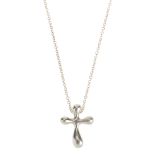 TIFFANY & CO. - an Elsa Peretti pendant. Designed as a belcher-link chain suspending a cross-shape