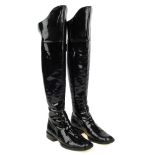 CHANEL - a pair of black patent leather over-the-knee boots. Designed with a flat block heel, full-