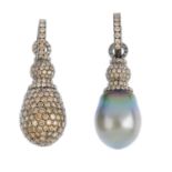 A pair of diamond and cultured pearl earrings. Designed as a cultured pearl drop, measuring 14 by