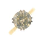 An 18ct gold diamond single-stone ring. The brilliant-cut diamond, with tapered band. Estimated