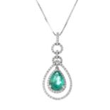 An 18ct gold emerald and diamond pendant. The pear-shape emerald and brilliant-cut diamond