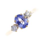 An 18ct gold sapphire and diamond ring. The oval-shape sapphire, with brilliant-cut diamond sides.