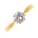 An 18ct gold diamond single-stone ring. The brilliant-cut diamond, with tapered sides. Estimated