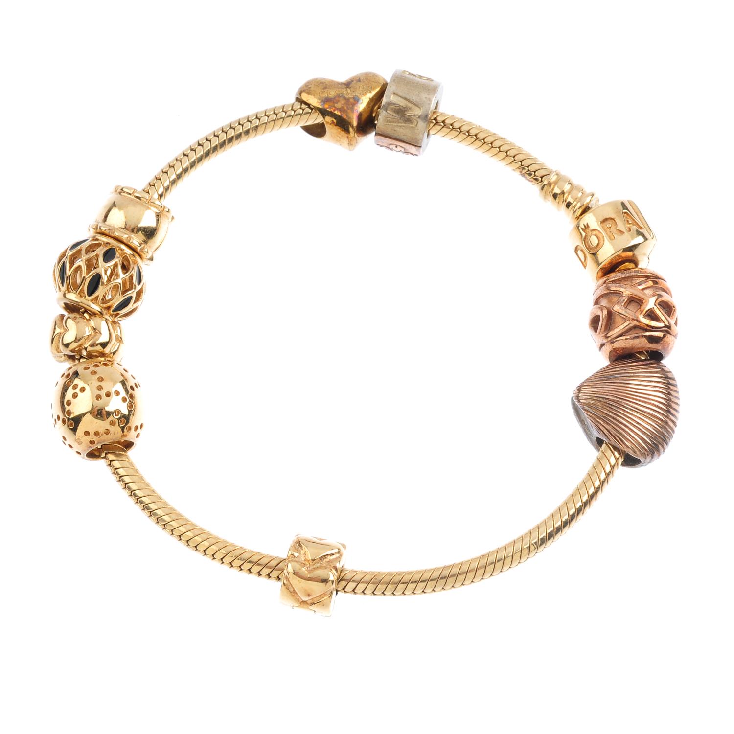 PANDORA and CLOGAU a charm bracelet. The Pandora bracelet, suspending