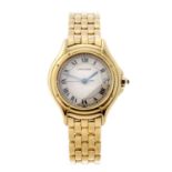 CARTIER - a Cougar bracelet watch. 18ct yellow gold case. Numbered 887921 001410. Signed quartz