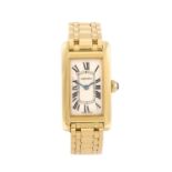 CARTIER - a Tank Americaine bracelet watch. 18ct yellow gold case. Reference 2482, serial