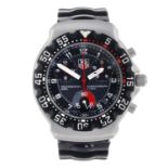 TAG HEUER - a gentleman's Formula 1 chronograph wrist watch. Stainless steel case with calibrated