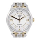 TISSOT - a gentleman's bracelet watch. Stainless steel case with exhibition case back. Reference