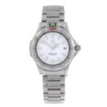 TAG HEUER - a mid-size 4000 Series bracelet watch. Stainless steel case with calibrated bezel.