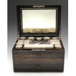 A late Victorian rosewood veneer travelling vanity case, of rectangular hinged form with double