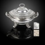 An impressive George IV silver twin-handled tureen and cover, the compressed circular form having an