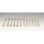 A set of Japanese silver pastry knives and forks, including nine knives and seventeen forks, each