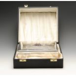 A George V silver mounted table cigarette box, presented in 1913 to a Dr. Walter W. H. Tate by the