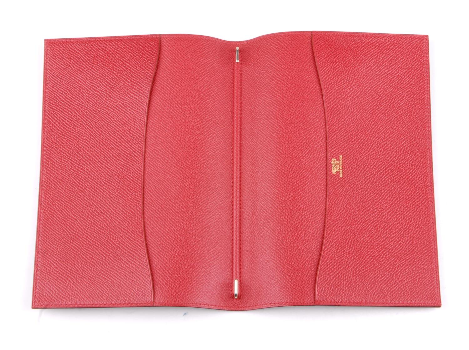 HERMÈS - a two-tone agenda dairy cover. Designed with a green leather exterior and contrasting red - Image 2 of 3