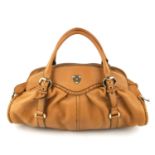 ALEXANDER MCQUEEN - a '1962' leather handbag. Crafted from caramel coloured leather, featuring