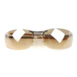CHRISTIAN DIOR - a pair of rimless sunglasses. Featuring gradient lenses and silver-tone metal