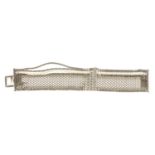 CHANEL - a bracelet. Designed as a wide woven link bracelet, with central tiered paste bars, to