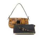 FENDI - two baguette handbags. The first, designed with a brown snakeskin patterned exterior with