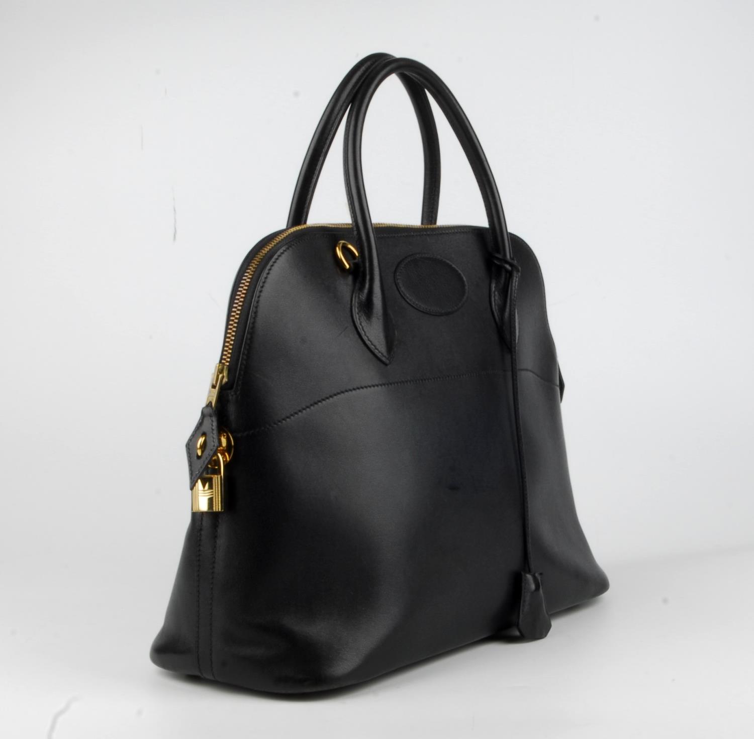 HERMÈS - a 1992 black Bolide handbag. Designed with a smooth black leather exterior and gold-tone - Image 3 of 4