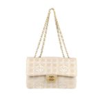 CHANEL - a pink Travel Line Flap handbag. Designed with a square quilted, pale pink logo fabric