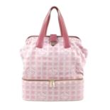 CHANEL - a pink logo Travel Line Gladstone handbag. Designed with a semi-structured shape, crafted