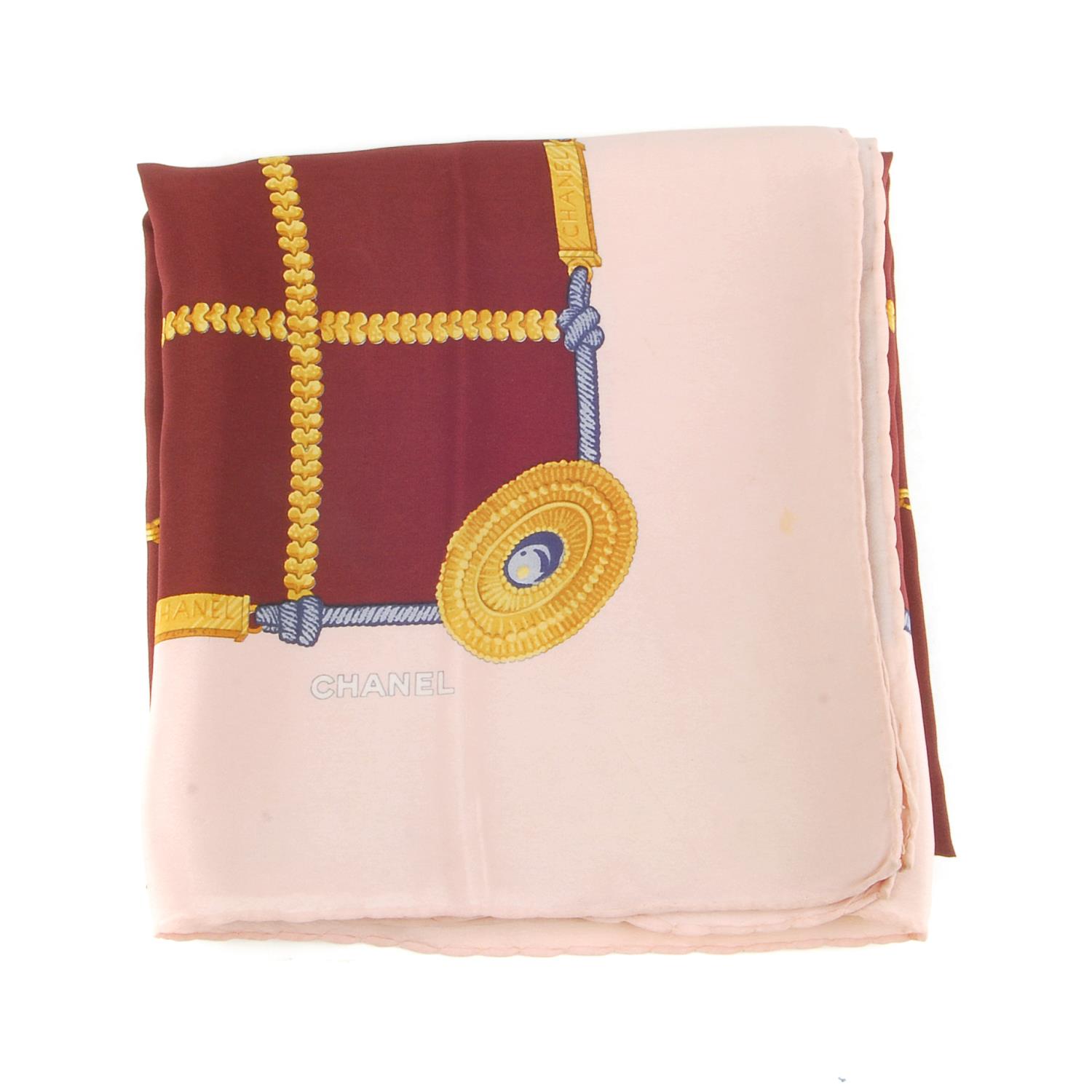 CHANEL - a scarf. The pink and purple shear scarf, featuring gold-tone crossover chains and a