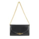 CARTIER - an evening handbag. Designed with a smooth navy blue calfskin leather exterior with