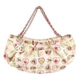 CHANEL - a small Valentine canvas handbag. Featuring printed multicoloured hearts onto a pale pink