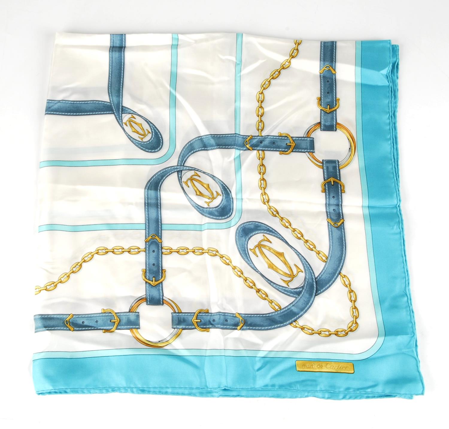 CARTIER - a 1980s Must De Cartier silk scarf. Featuring a stylised equestrian print with belt straps - Image 2 of 2