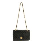 CHANEL - a Medium Classic Double Flap handbag. Designed with maker's iconic diamond quilted black