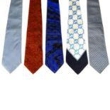 GUCCI - eight ties. To include a orange paisley tie, a blue tie with gold GG pattern, a pale blue
