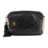 CHANEL - a vintage quilted tassel handbag. Crafted from soft lambskin diamond quilted leather,