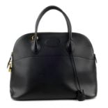 HERMÈS - a 1992 black Bolide handbag. Designed with a smooth black leather exterior and gold-tone