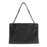 CHANEL - a metallic leather shopping handbag. Featuring a black metallic calfskin leather exterior