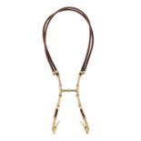 HERMÈS - a Bamboo halter necklace scarf clip. Designed to be worn as a necklace or to hold a bustier