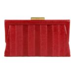 ANYA HINDMARCH - a bespoke lizard clutch. Crafted from red lizard skin, featuring a gold-tone top