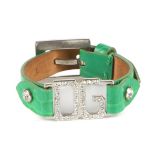 DOLCE & GABBANA - a bracelet. A green crocodile embossed leather bracelet featuring rhinestone