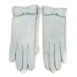 HERMÈS - a pair of vintage leather gloves. Crafted from duck egg blue leather, with leather bow