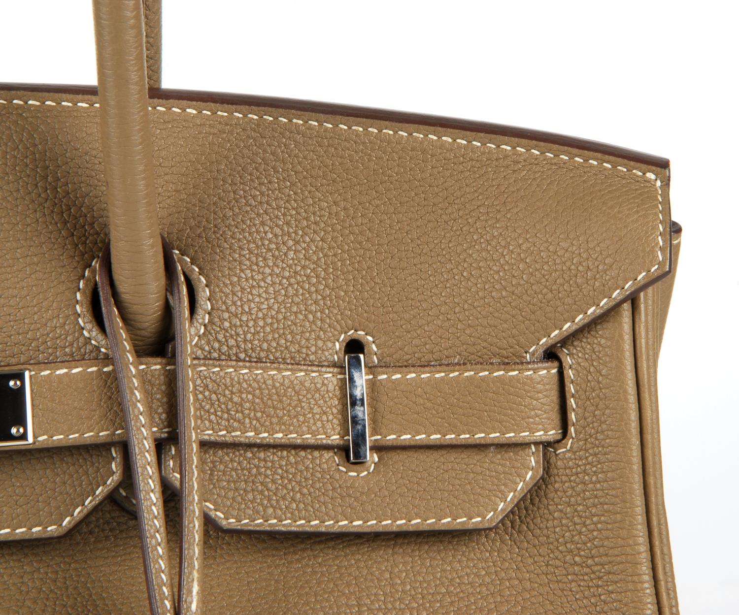 HERMÈS - a 2009 taupe Fjord Birkin 35 handbag. Featuring a grained fjord leather exterior, dual - Image 2 of 8