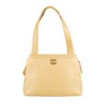 CHANEL - a late 90s small beige Caviar leather handbag. Crafted from beige textured caviar