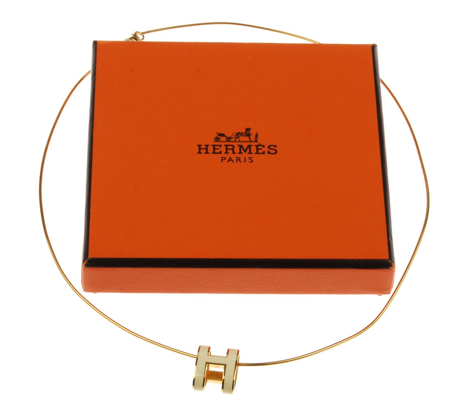 HERMÈS - a Pop H necklace. Featuring maker's ivory enamelled 'H' emblem on a gold-tone snake - Image 2 of 2