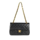 CHANEL - a Small Classic Double Flap handbag. Designed with maker's iconic diamond quilted black