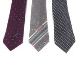 BALENCIAGA - three ties. To include a navy blue tie with thin red diagonal stripes and small white