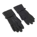 CHANEL - a pair of leather Gauntlet gloves. Crafted from soft black lambskin leather, featuring a