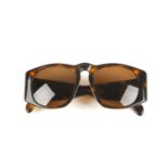 CHANEL - a pair of sunglasses. Featuring imitation tortoiseshell acetate frames, with brown tinted