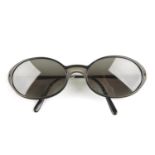 CARTIER - a pair of sunglasses. Crafted with grey and black acetate frame, featuring green tinted