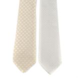 CÉLINE - two ties. To include a silver and a gold tie, both featuring the maker's signature