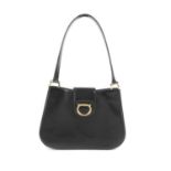 CÉLINE - a vintage handbag. Designed with a structured shape, featuring a smooth black leather