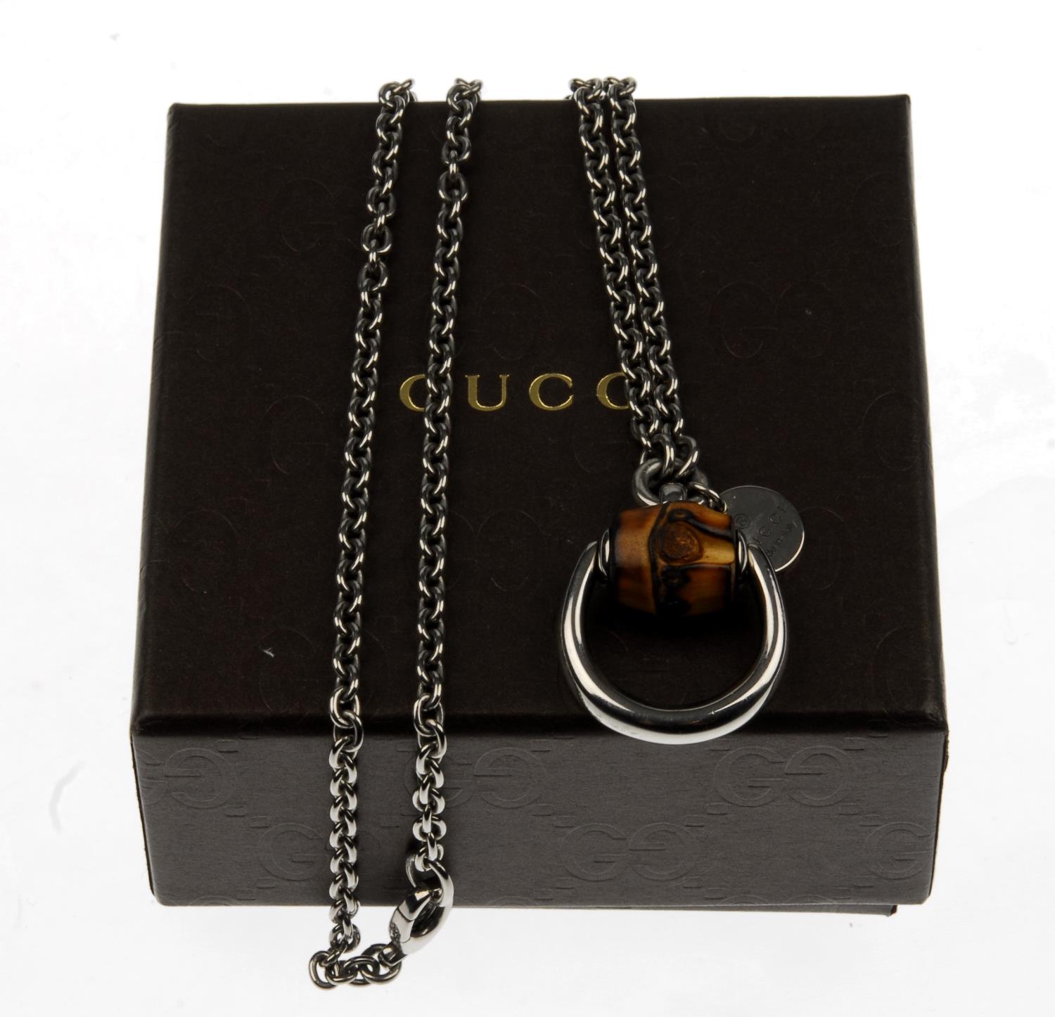 GUCCI - a silver and bamboo Horsebit pendant and chain. Featuring a bamboo accent and horsebit motif - Image 2 of 2